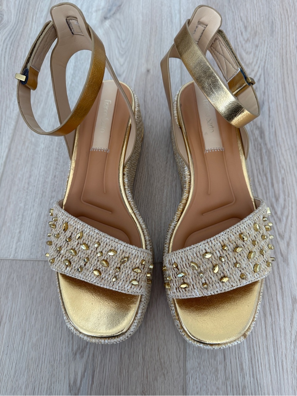 Franco Sarto
"Terry" gold and natural woven embellished wedge sandals 9.5
